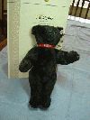 Steiff Black bear with red collar